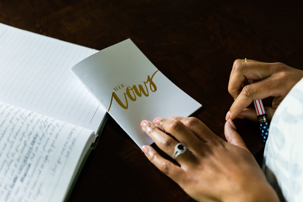 Bride writing wedding vows