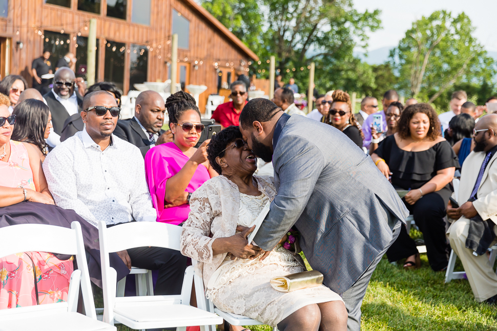 Groom embracing grandmother