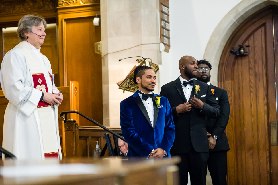 Groom watching Bride come down the aisle