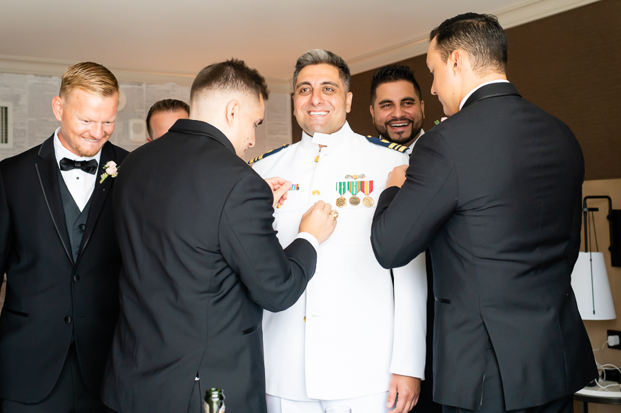 Wedding at Baltimore Harbor groom getting ready at the Baltimore Marriott Waterfront
