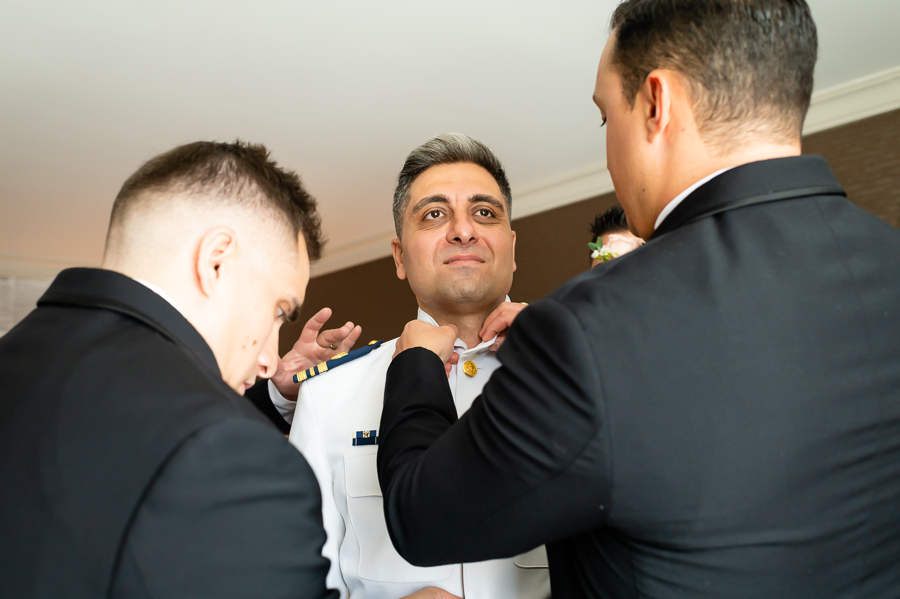 groom getting ready at the Baltimore Marriott Waterfront
