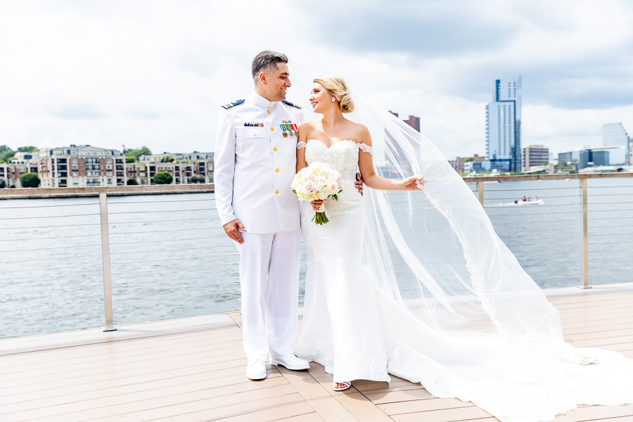 Wedding at Baltimore Harbor intimate portrait of bride by the water