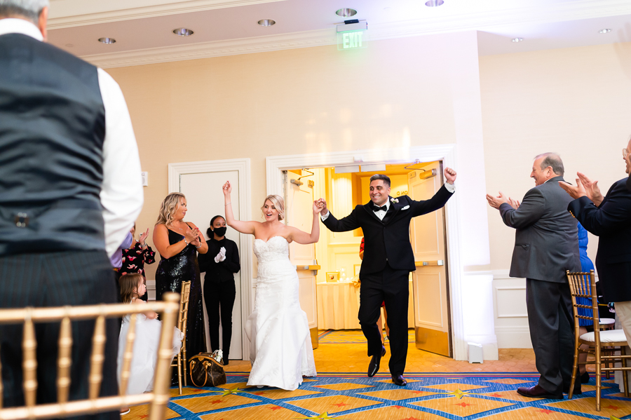 Wedding at Baltimore Harbor bride and groom entrance at Baltimore Marriott Waterfront ballroom
