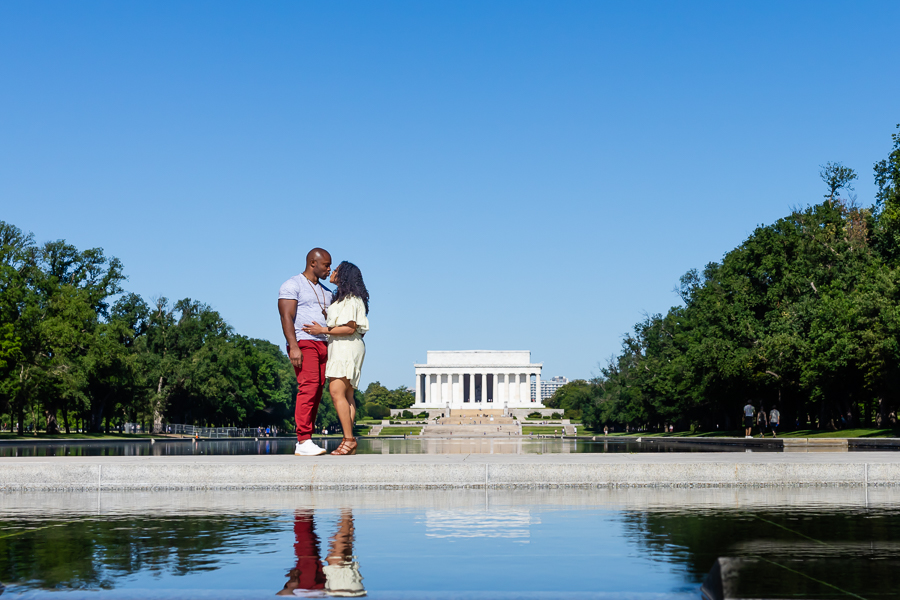 M and B posing in front of the D.C. Lincoln Memorial architecture.