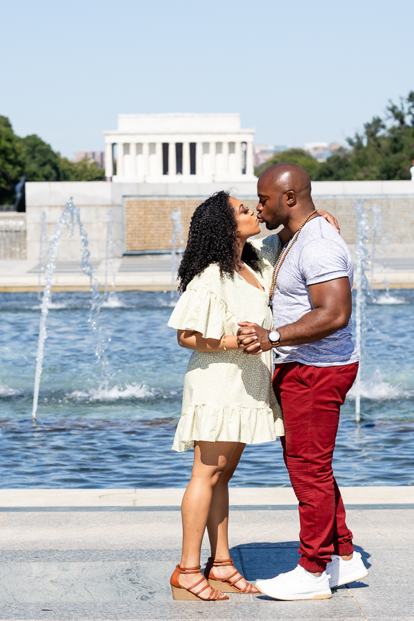 A playful moment captured between M and B's engagement session in DC