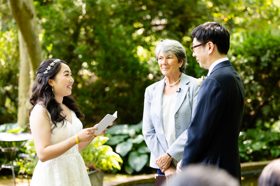 bride reading wedding vows