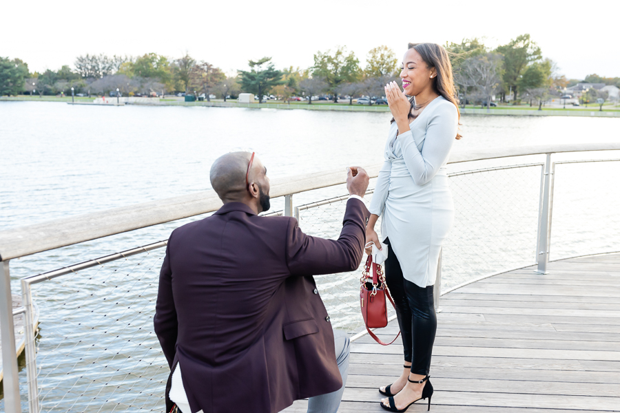 Chas proposing to Kia on The Wharf Pier during the Stunning DC Surprise Proposal.