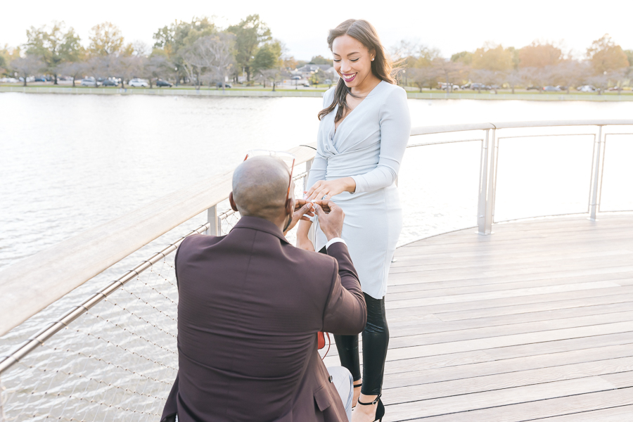 Chas proposing to Kia on The Wharf Pier during the Stunning DC Surprise Proposal.