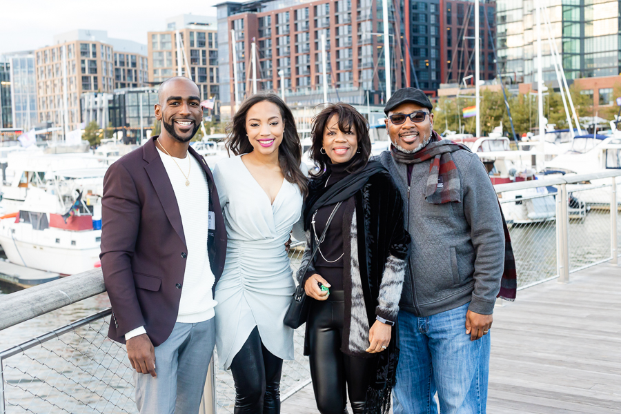 Family and friends celebrating the Stunning DC Surprise Proposal at The Wharf.