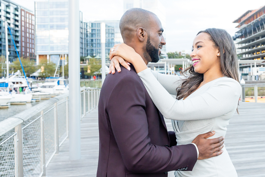 Happy couple captured at The Wharf Pier during the Stunning DC Surprise Proposal.