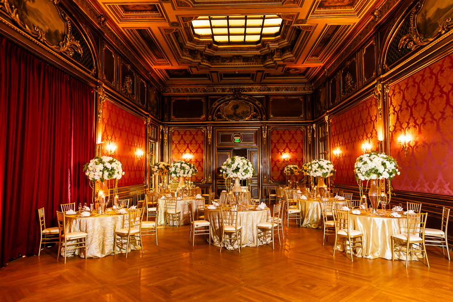 The Engineers Club Wedding reception setup with floral centerpieces.
