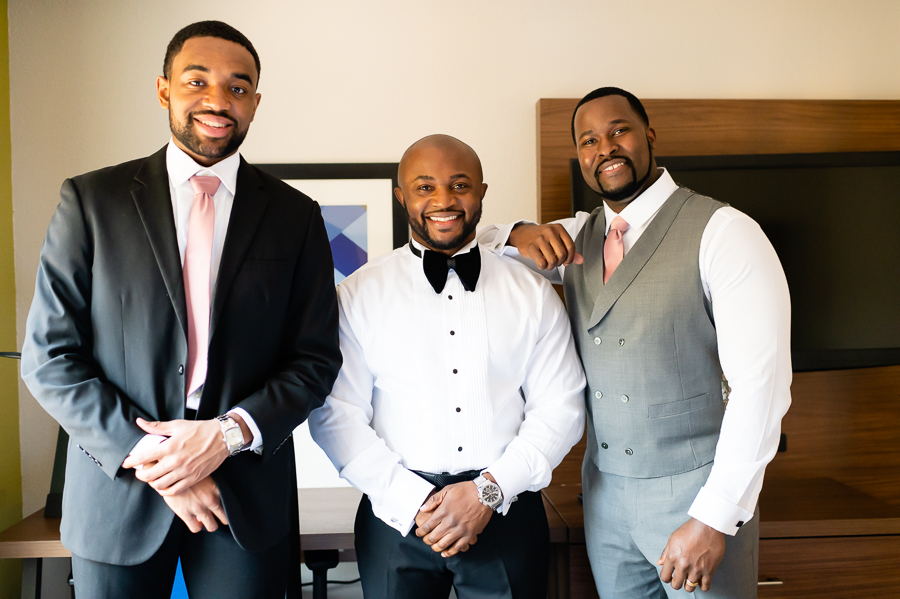 groom prep with groomsmen