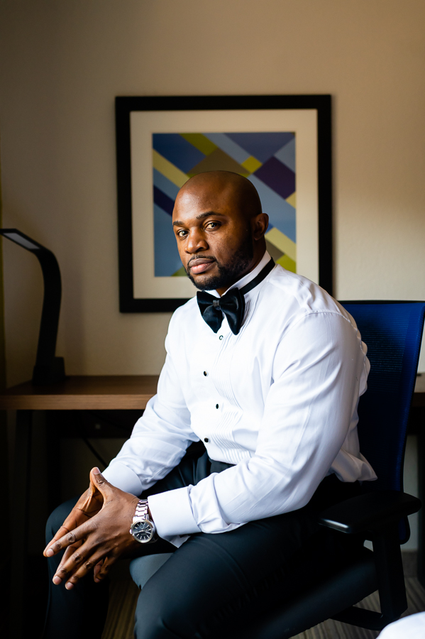 groom prep portrait