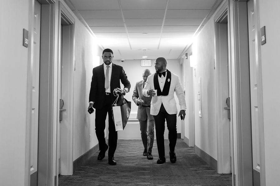 groomsmen heading to the ceremony from the hotel