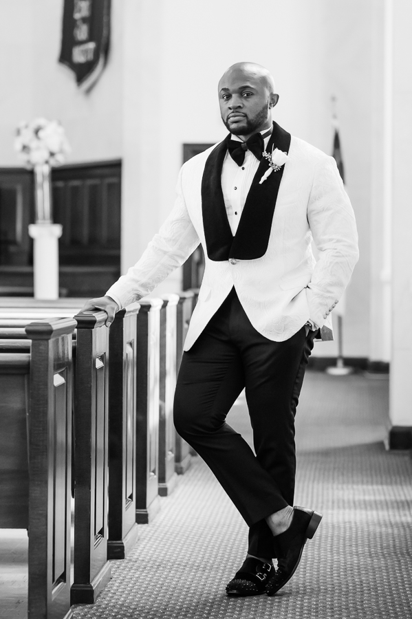 groom portrait at the church