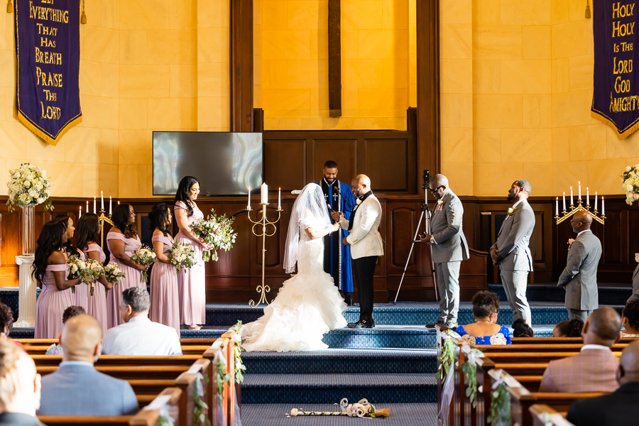 bride and groom at the altar