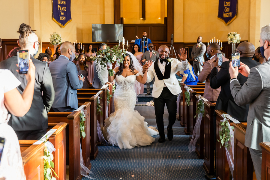 bride and groom celebratory exit