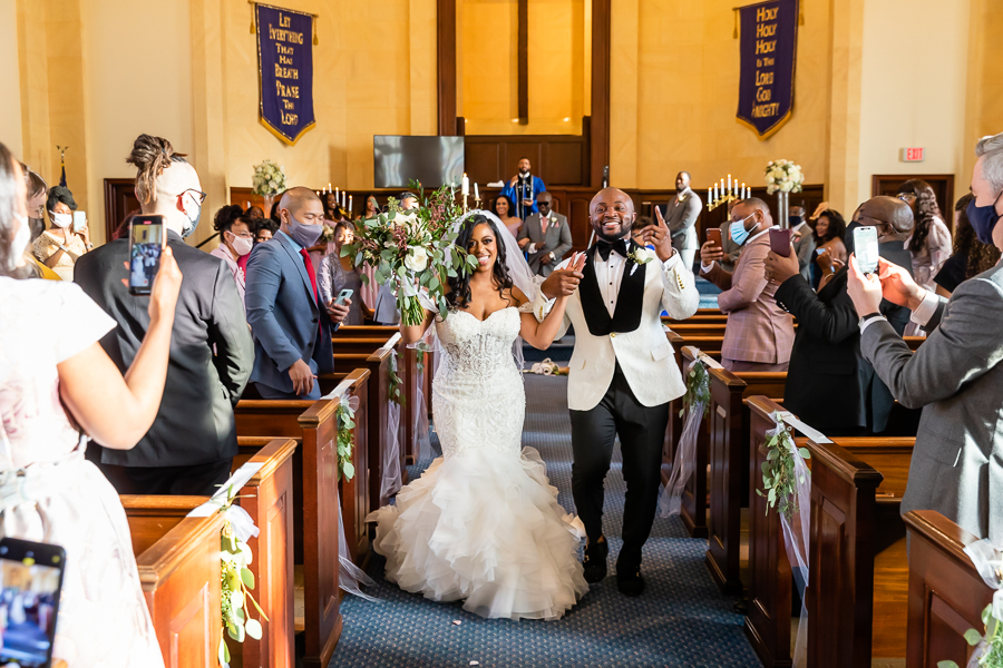 bride and groom celebratory exit