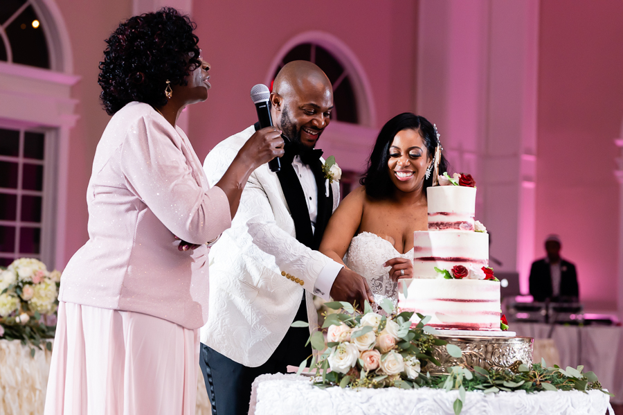 Wedding cake cutting at Fox Chase Manor 