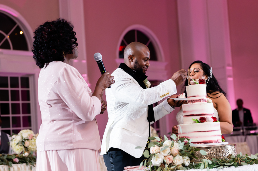 Wedding cake cutting at Fox Chase Manor 