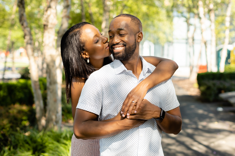 The couple sharing a quiet moment at the Navy Yard Waterfront Engagement