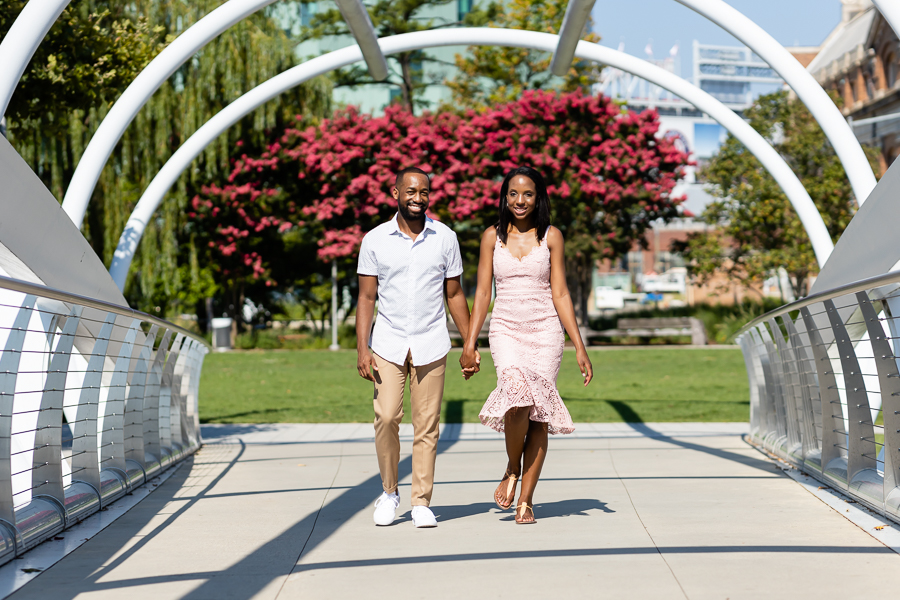 Close-up of the couple holding hands at the Navy Yard Waterfront engagement session.