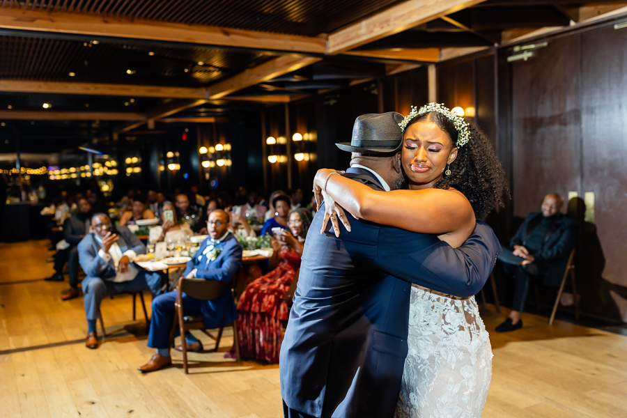 Father-daughter dance hug