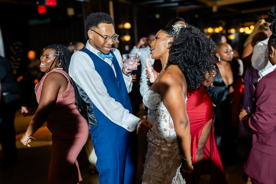 bride and groom share a dance