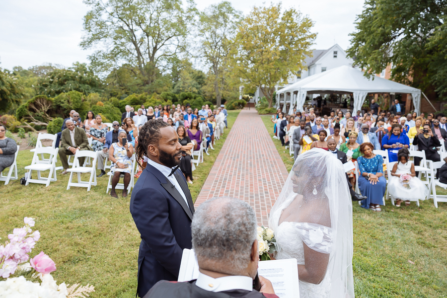 bride and groom exchanging vows