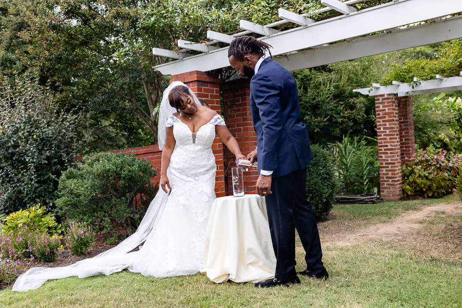 bride and groom pouring sand