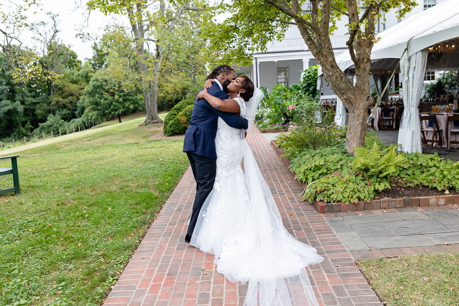 couple share an embrace after getting married