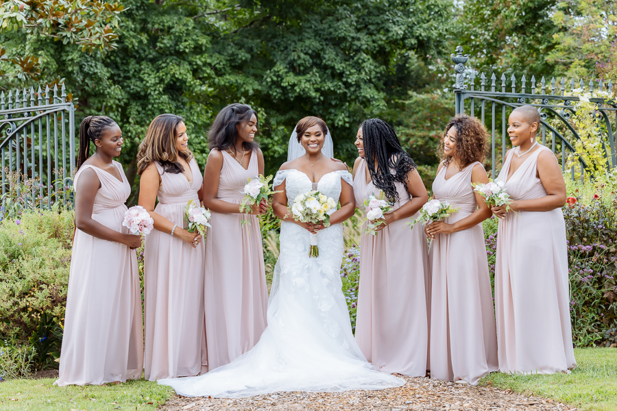 brides maids posing in gardens at River Farm