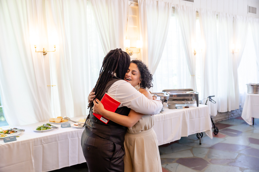 couple embracing during their intimate wedding reception